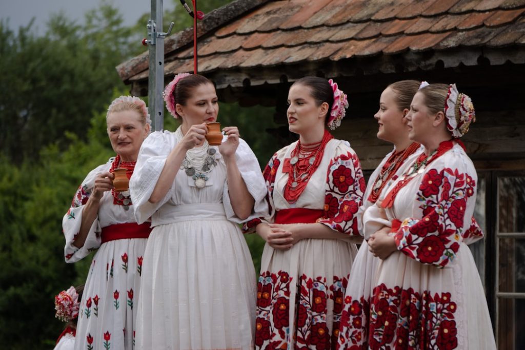 a-group-of-women-standing-next-to-each-other-6mvikfx0oiq Tradition in Croatia, Buševec